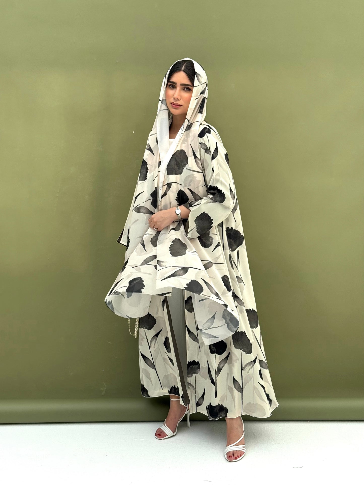 A printed fabric abaya green floral patterns