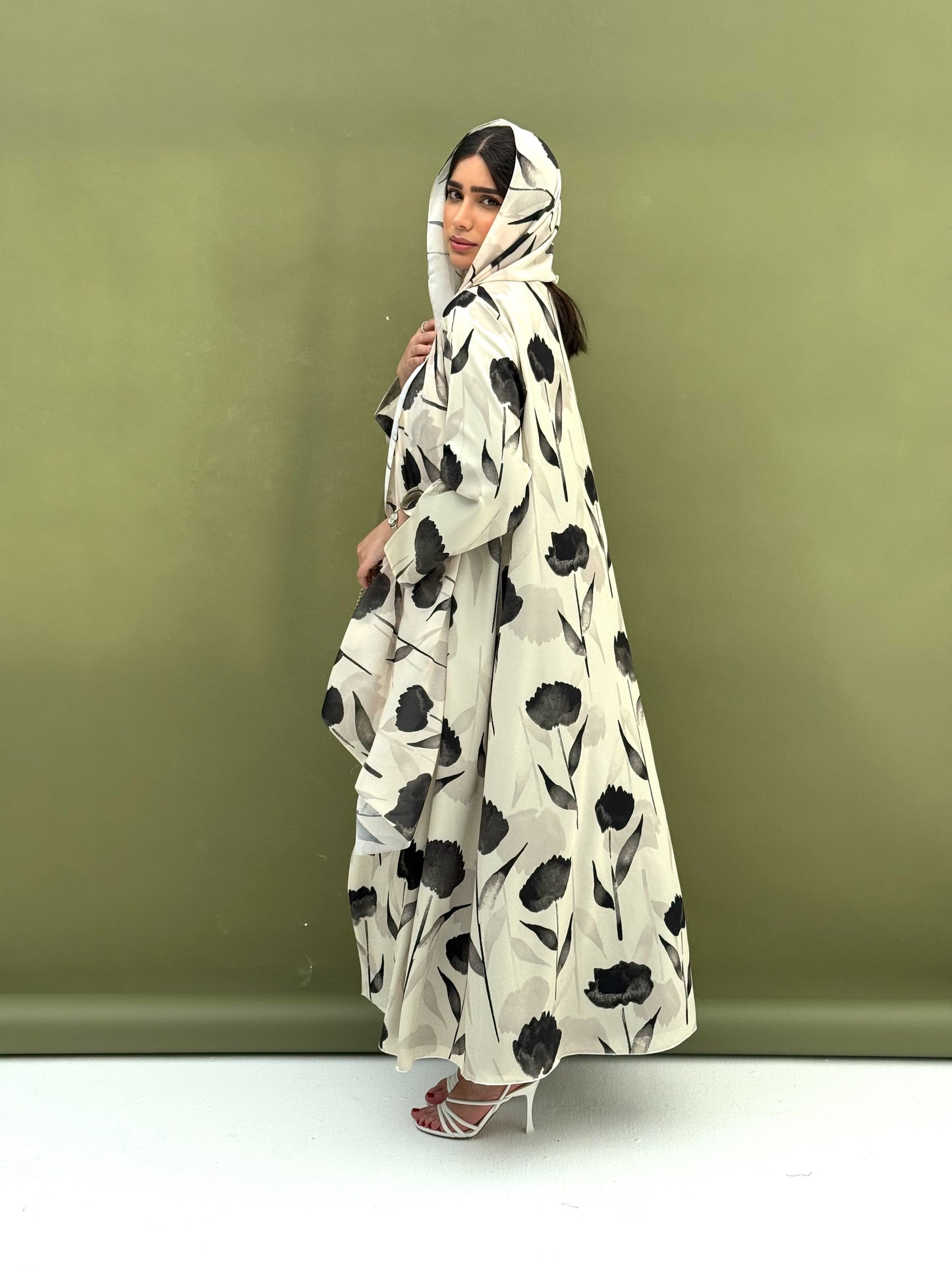 A printed fabric abaya green floral patterns