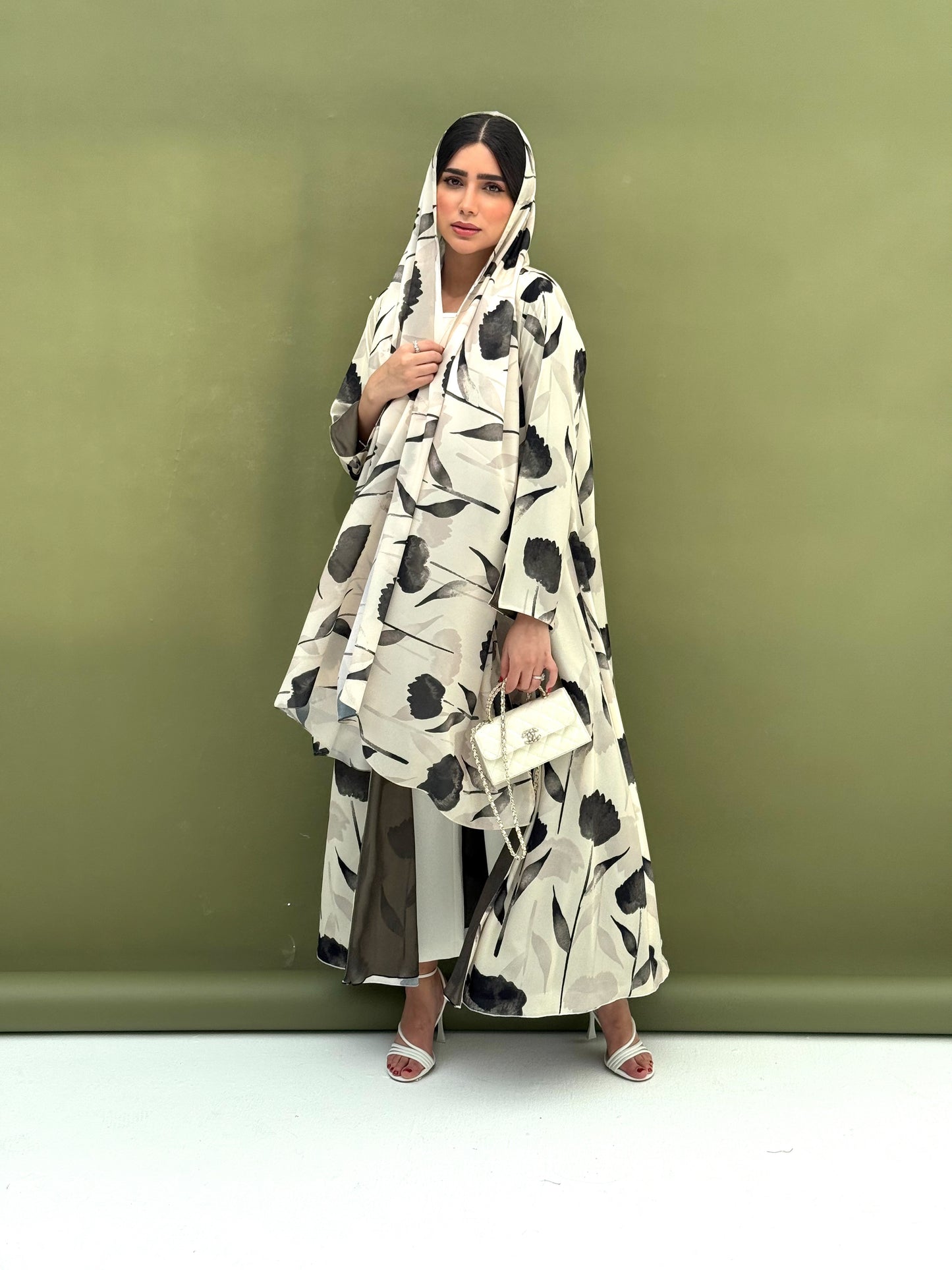 A printed fabric abaya green floral patterns