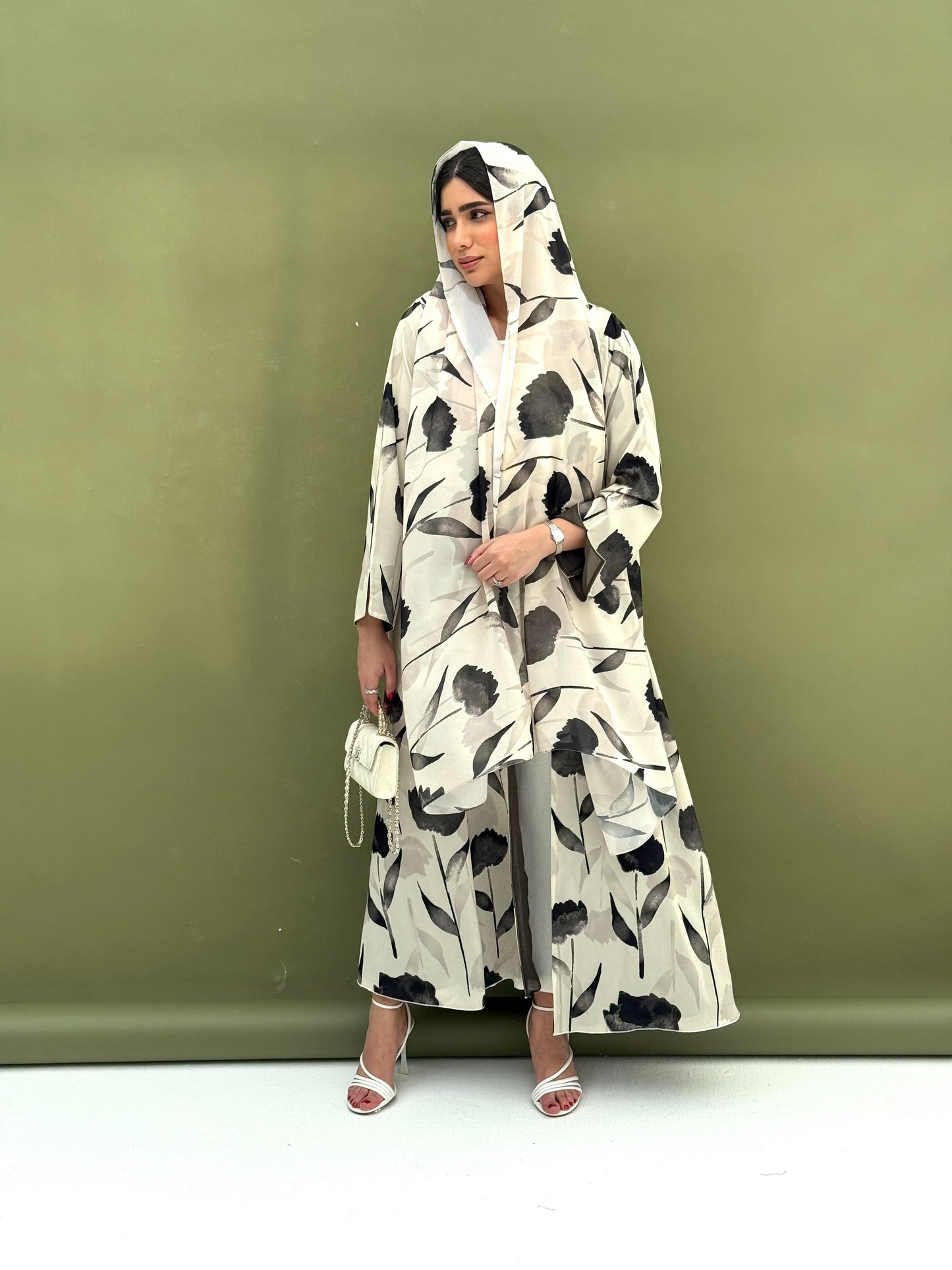 A printed fabric abaya green floral patterns