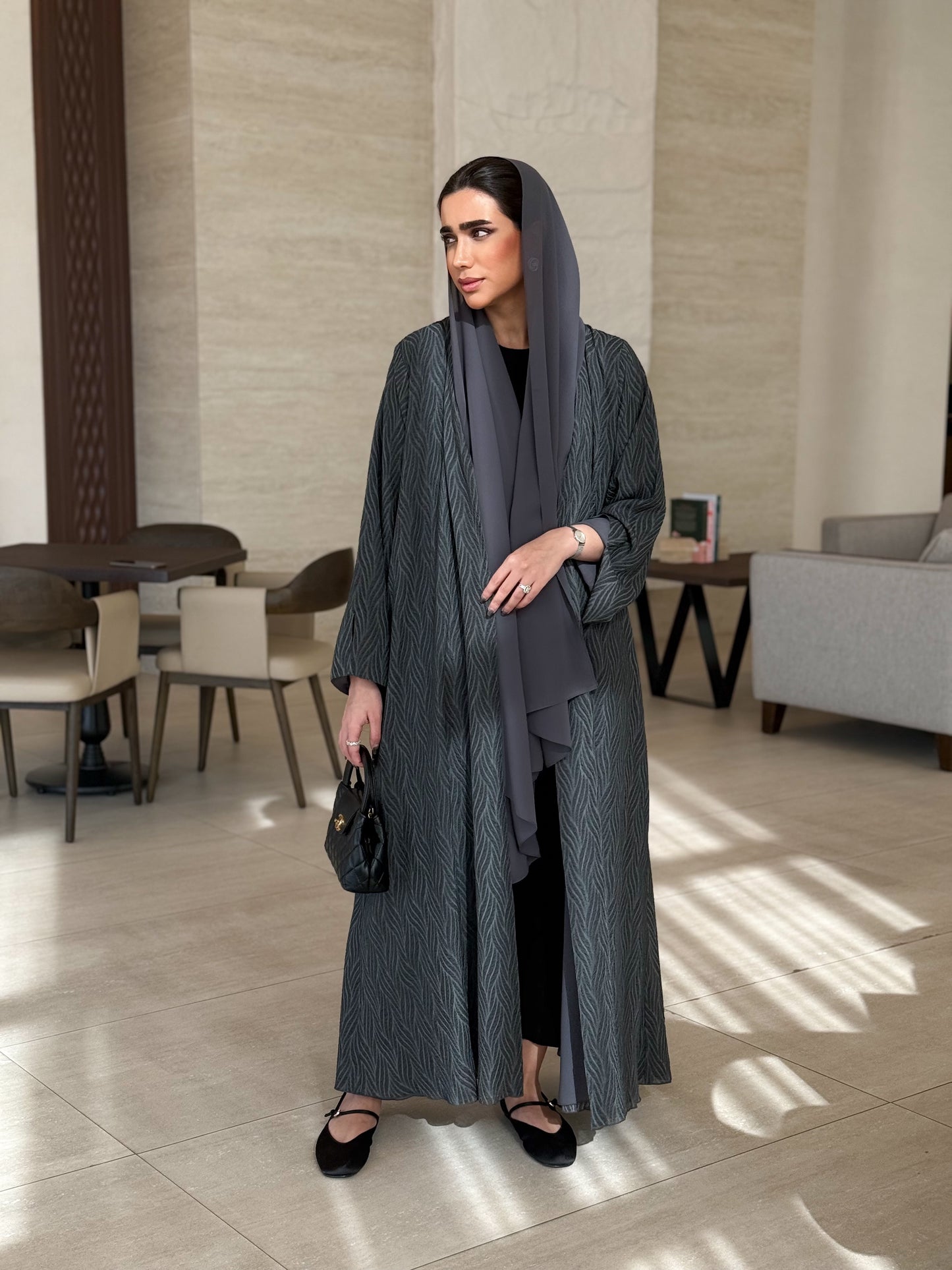 A casual dark-grey abaya