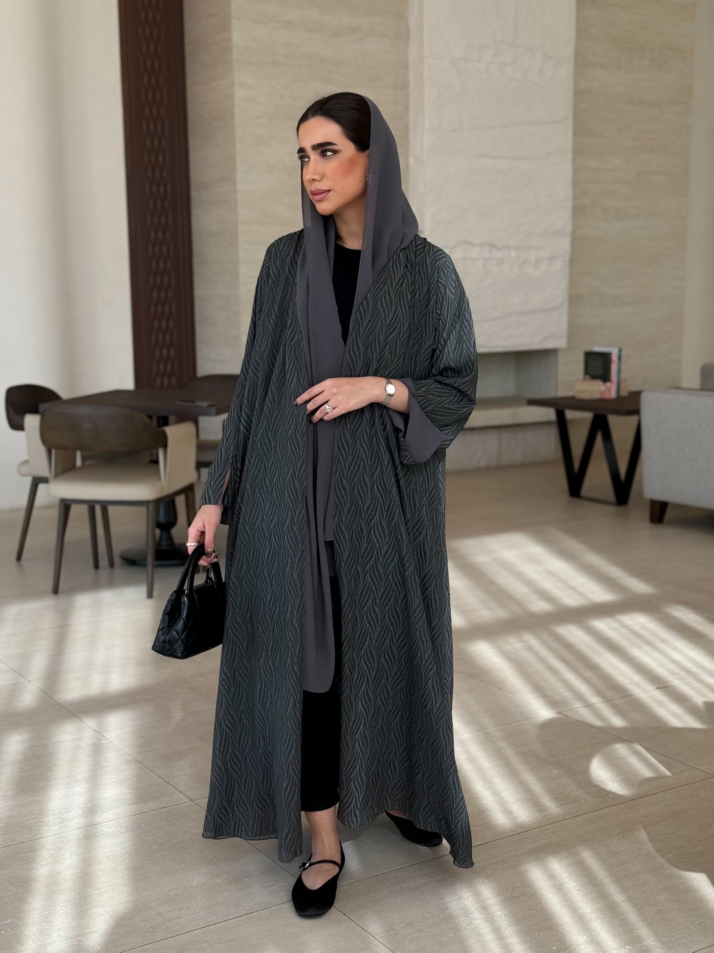 A casual dark-grey abaya