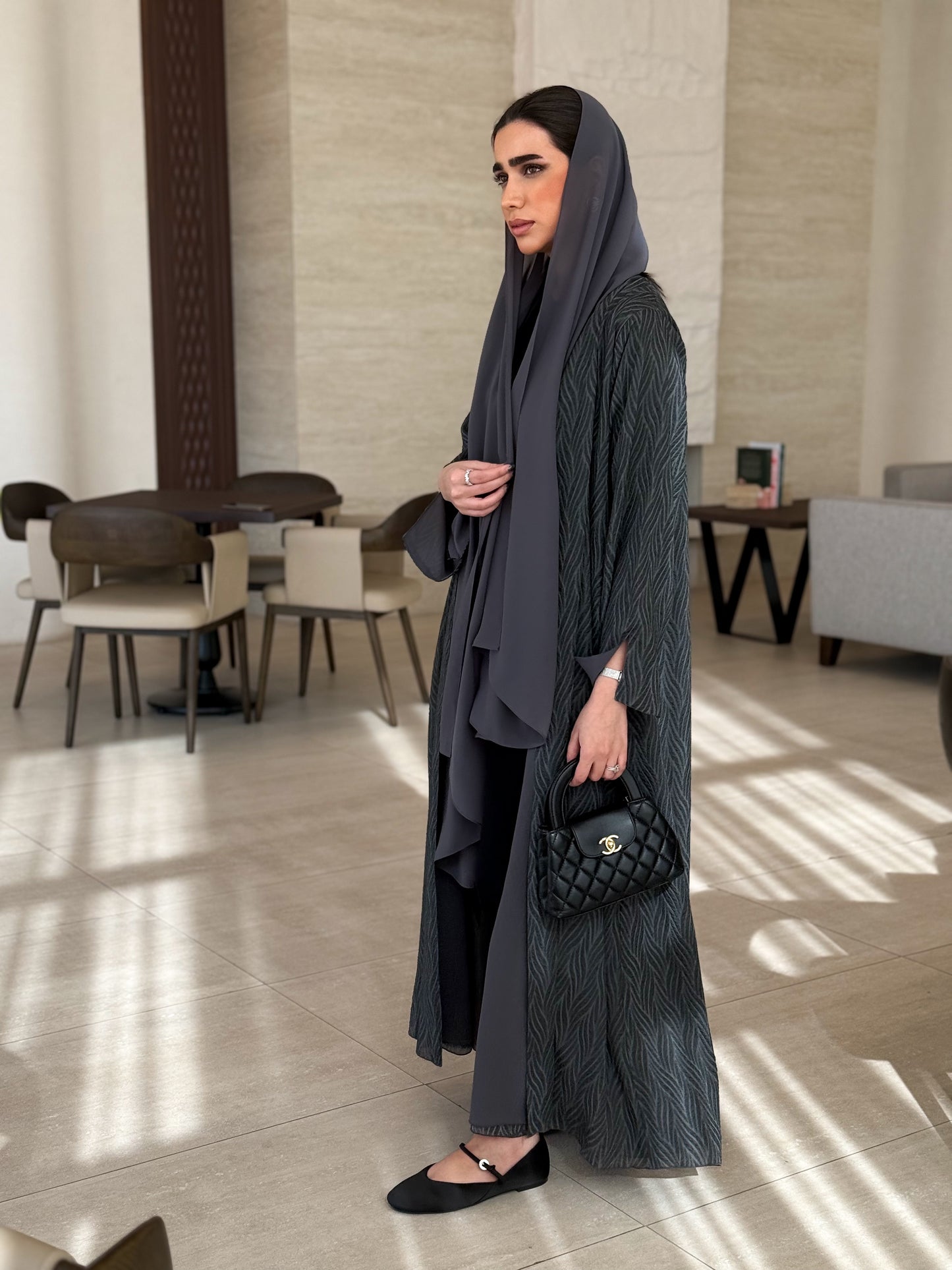 A casual dark-grey abaya