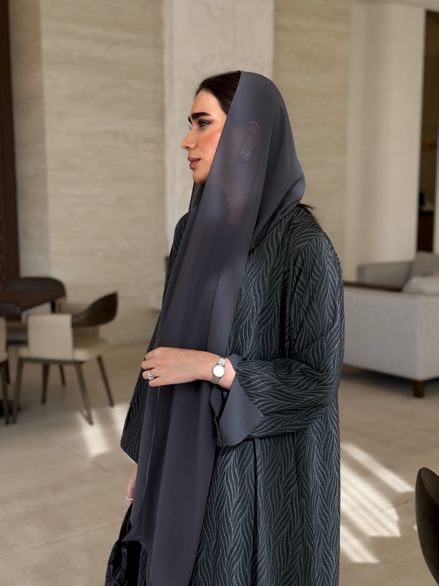 A casual dark-grey abaya