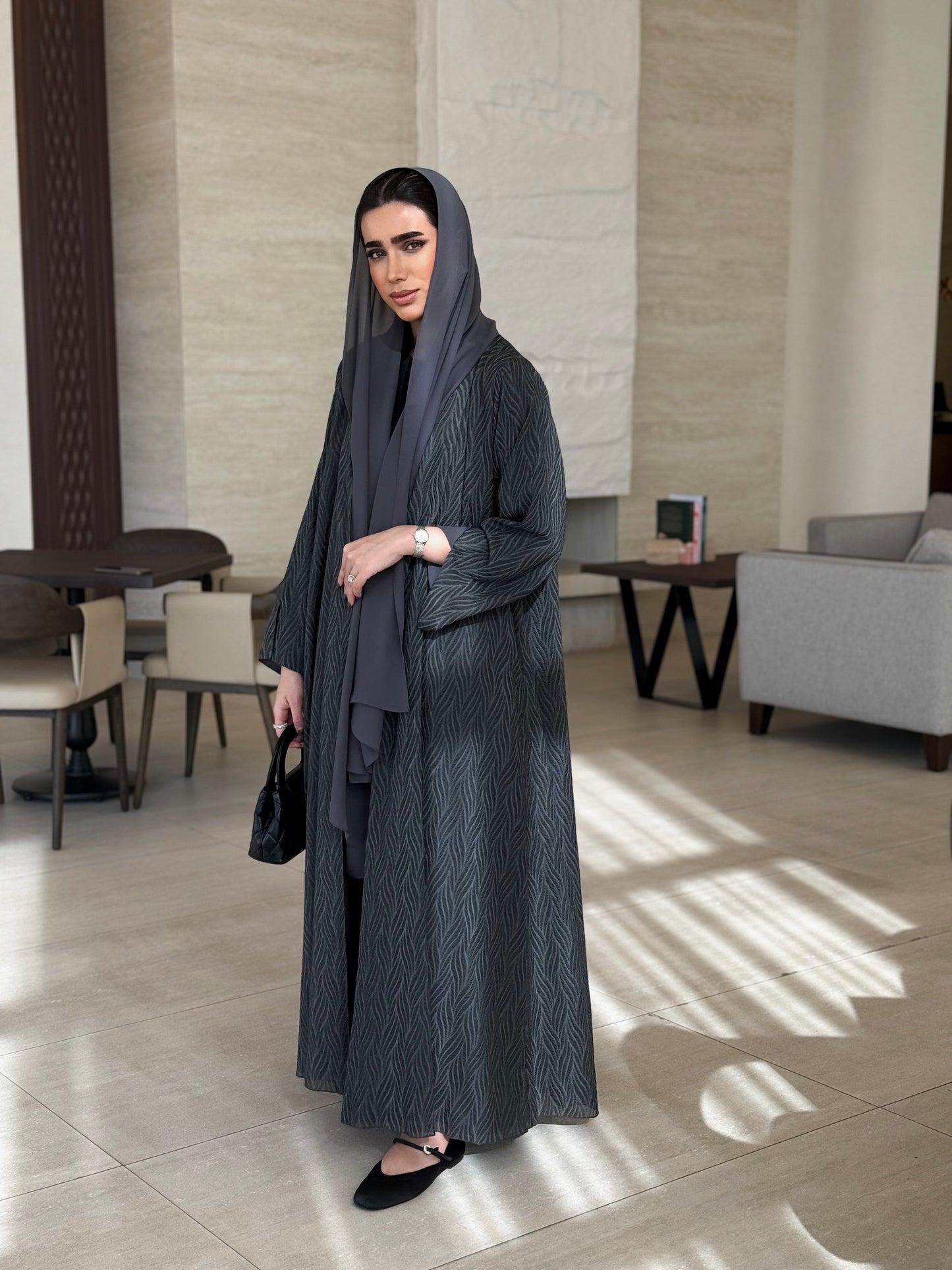 A casual dark-grey abaya