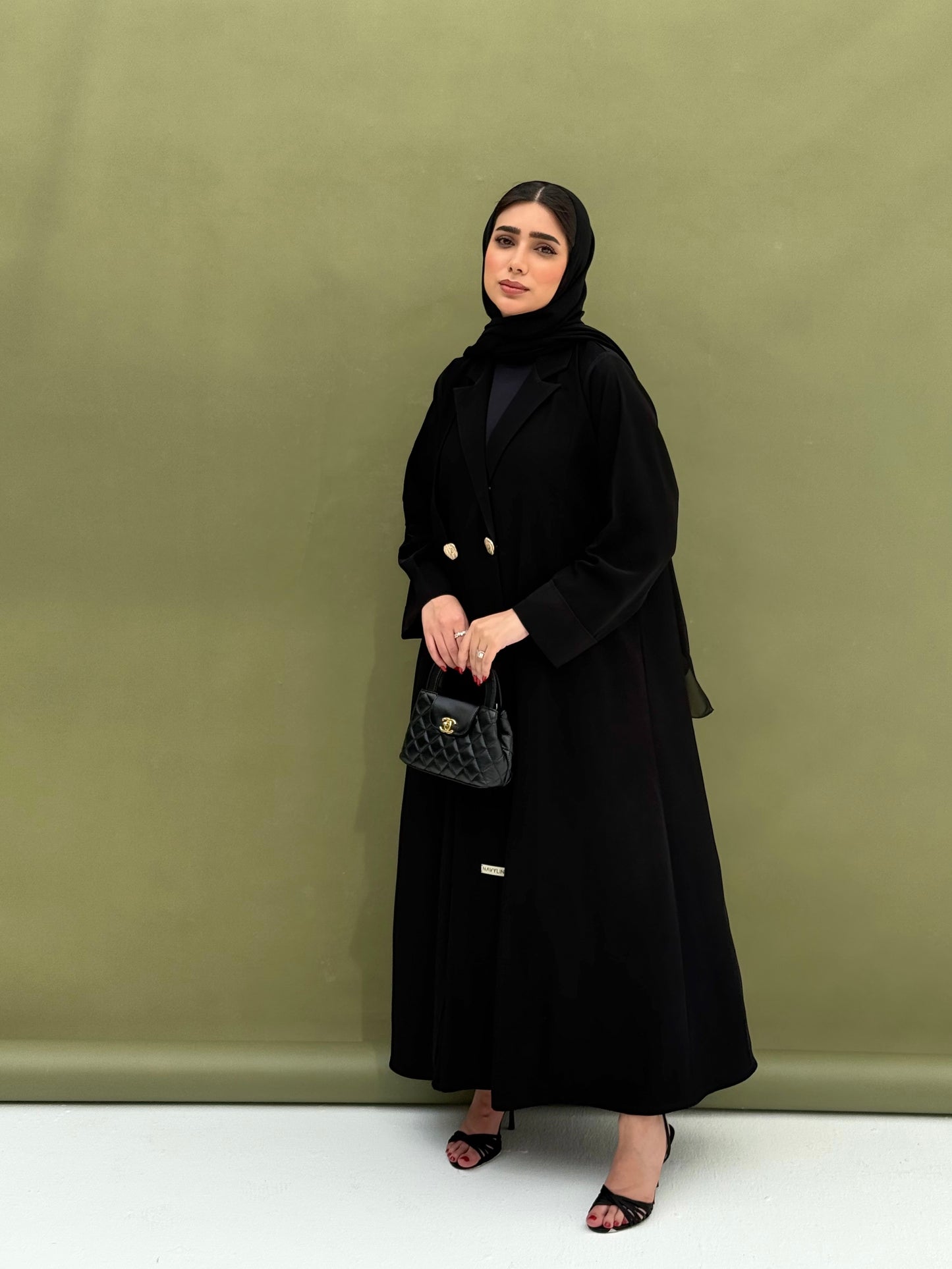 A black collar abaya, suitable for work