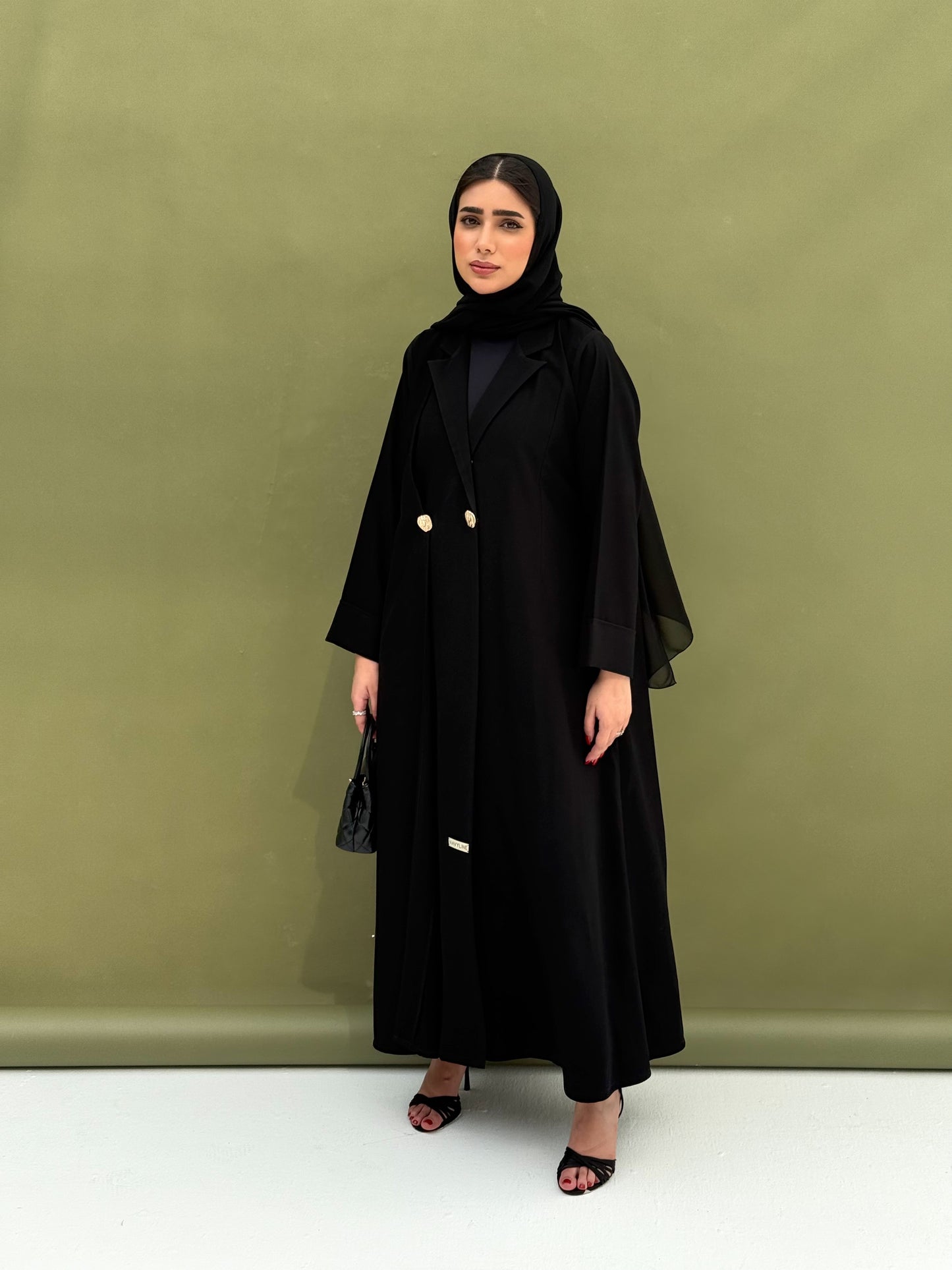A black collar abaya, suitable for work