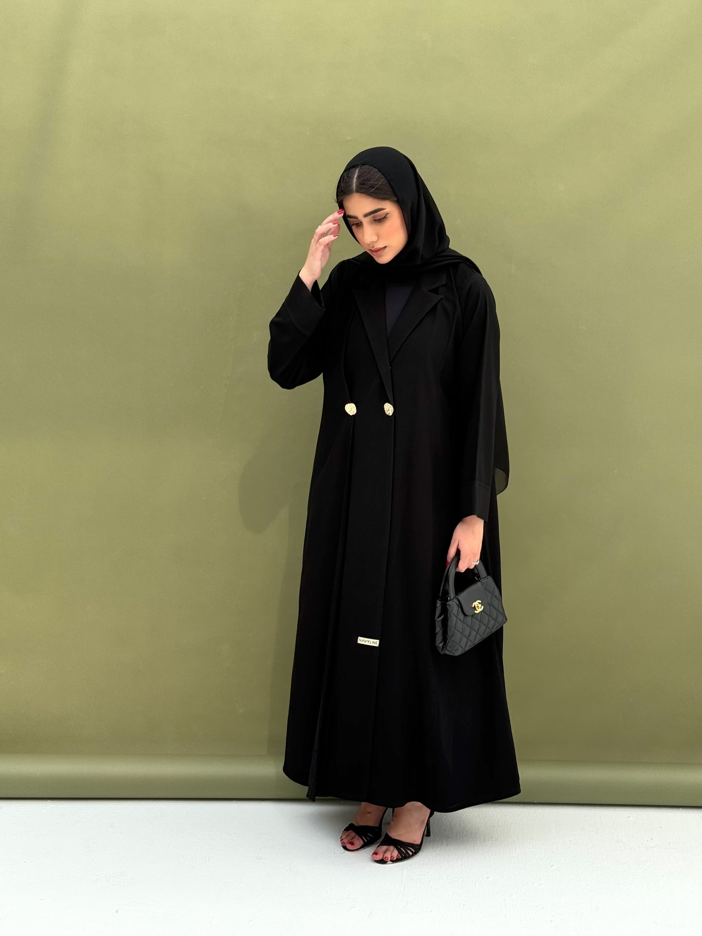 A black collar abaya, suitable for work