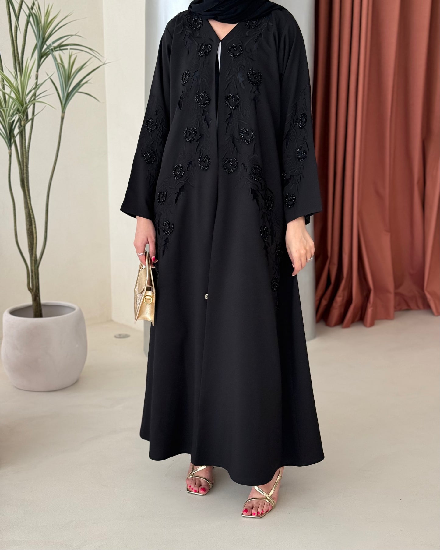 Black abaya featuring exquisite handwork