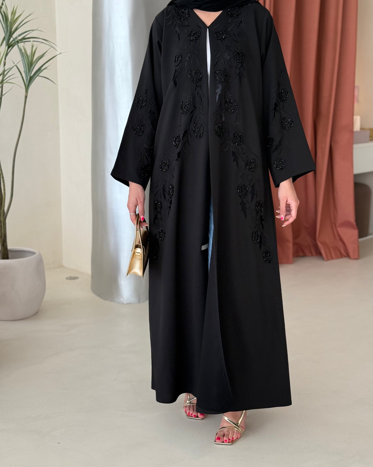 Black abaya featuring exquisite handwork