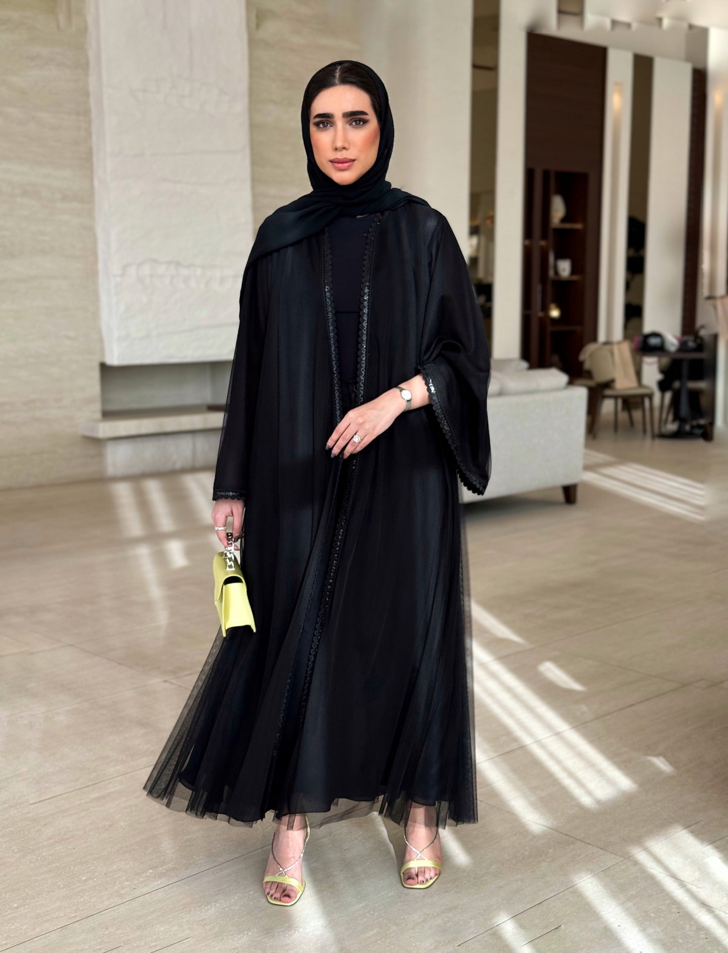 An elegant abaya featuring unique tailoring