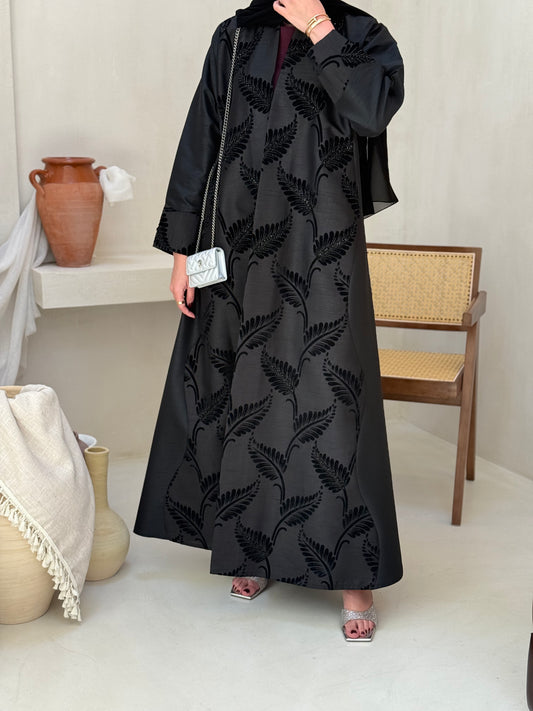 Abaya with elegant black embellishments